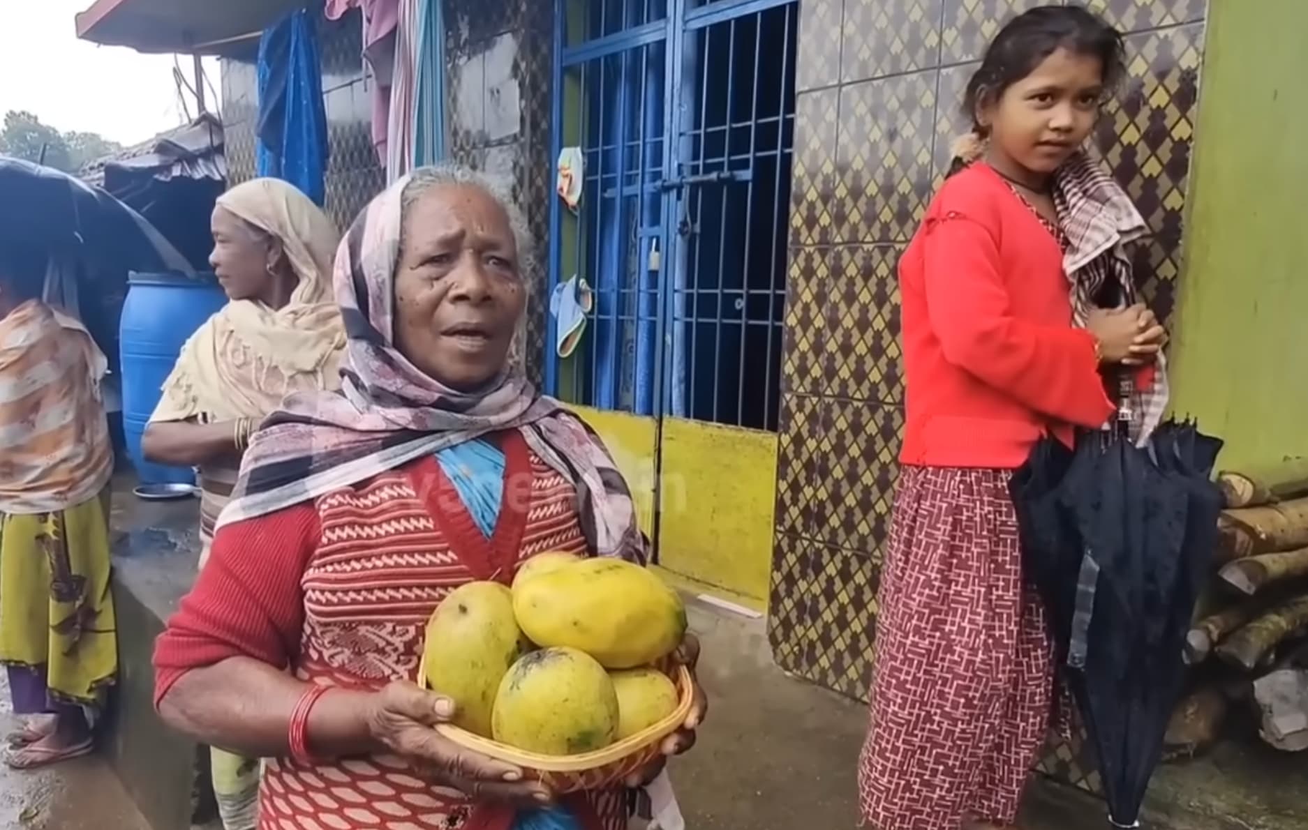 Kuridi villagers receiving mangoes from Pawan Kalyan's farm